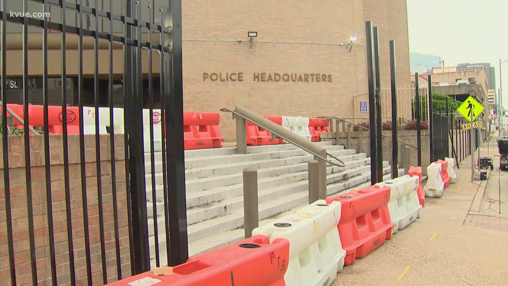The Austin Police Department started constructing permanent fencing outside the front steps of its headquarters in Downtown Austin.