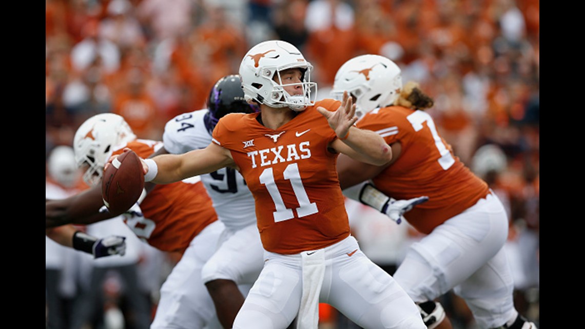 Texas wide receiver Lil'Jordan Humphrey, left, celebrates after scoring a  touchdown on a 15-yard reception with teammate John Burt (1) against  Oklahoma during the second half of an NCAA college fo …