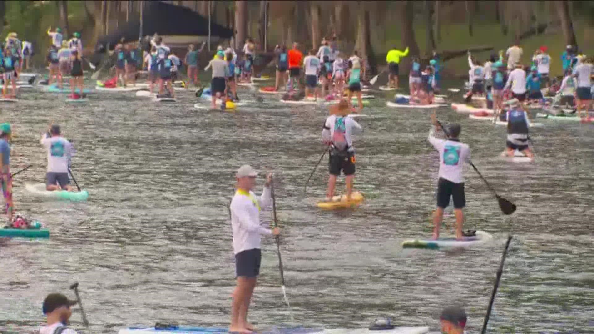 Hundreds of Austinites will paddle across Lake Austin to raise money for a cancer therapy nonprofit organization.