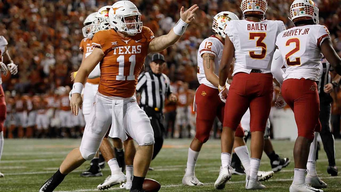 Longhorns' Sam Ehlinger wears Drew Brees Westlake HS jersey prior