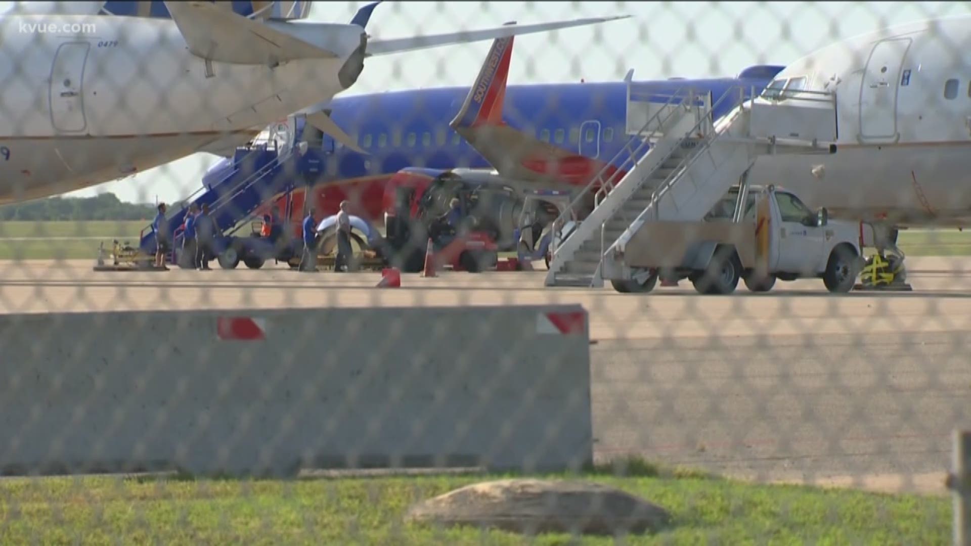 Officials have said the person was not authorized to be on the runway.