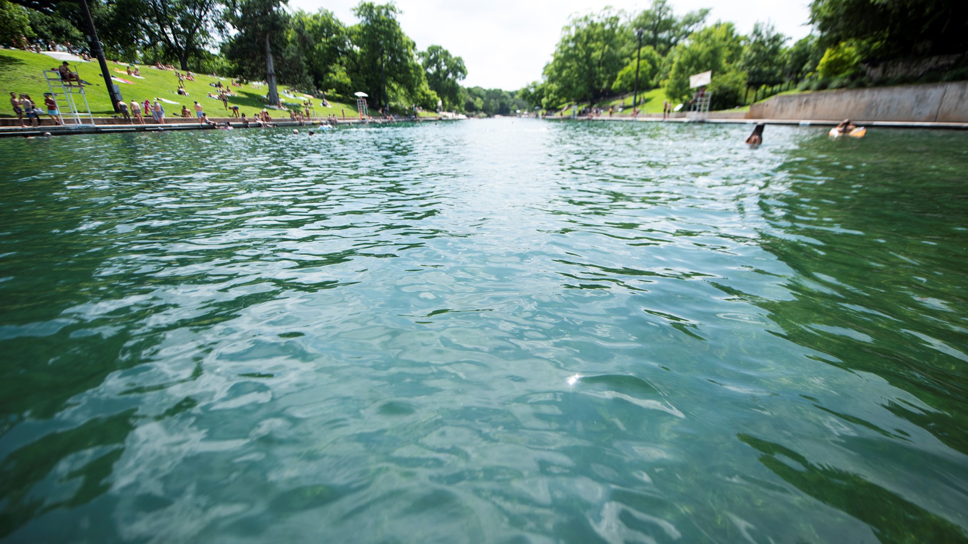 KVUE's Matt Fernandez spoke with a family visiting from Australia and an Austin native who's been coming to Barton Springs Pool for more than 50 years.