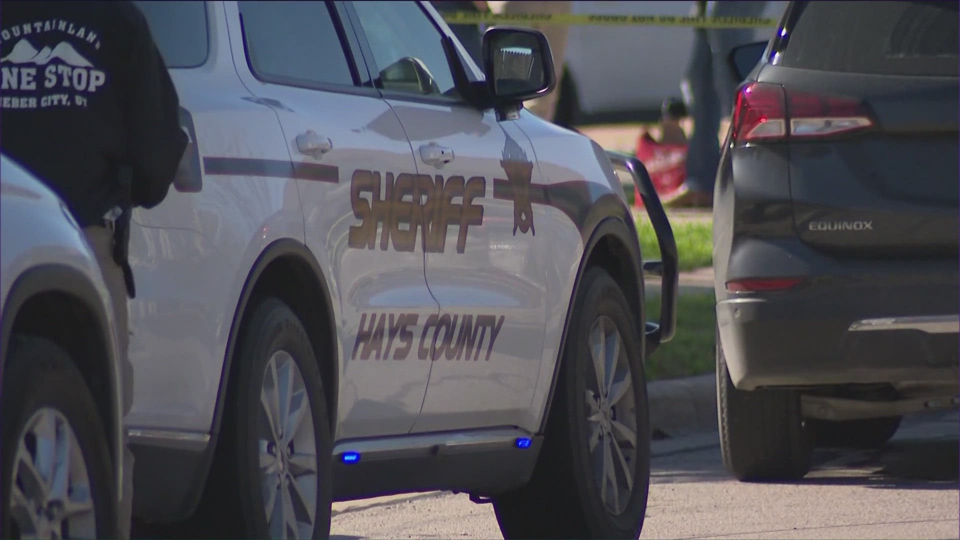The Hays County Sheriff's Office said two deputies fired their guns at the suspect after he refused to drop two knives he was holding.