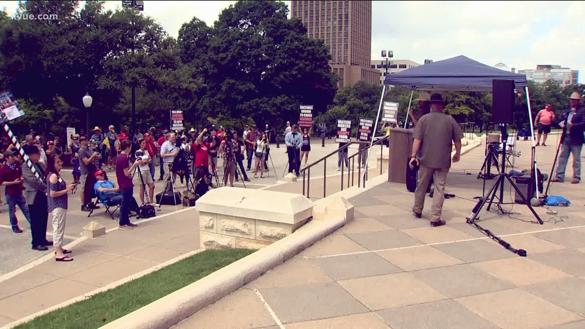 At the State Capitol on Saturday, protesters called for Gov. Greg Abbott to fully open the state.