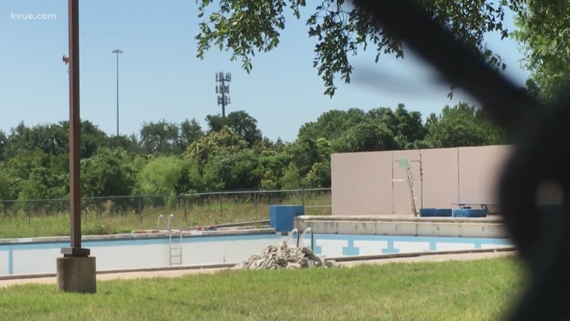 In spite of the heat, many Austin neighborhood pools are still closed. The city says it's following the same schedule as last year. But some people want to see them all open now.