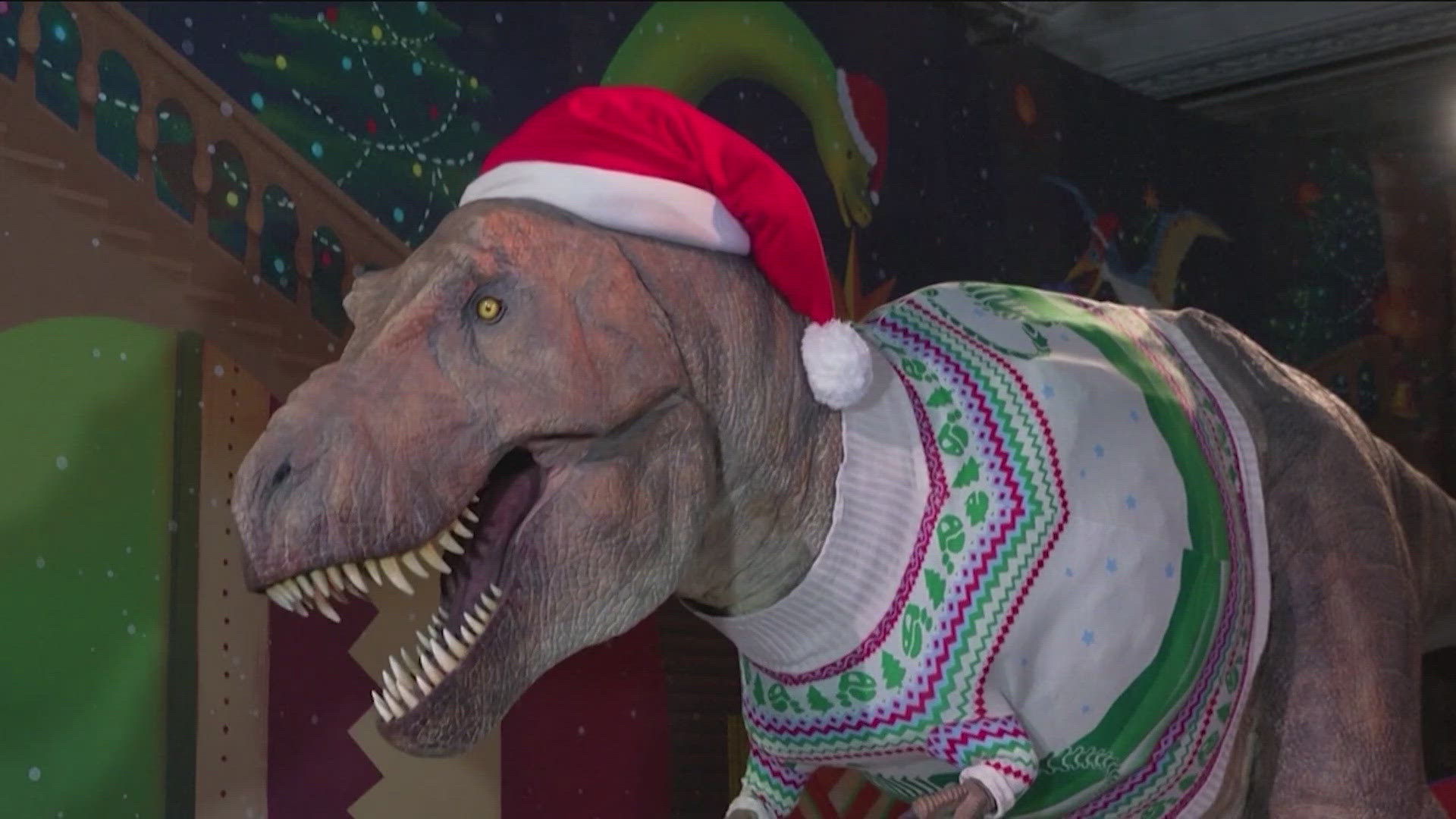 This is the fourth year the dinosaur has been dressed for the holidays.