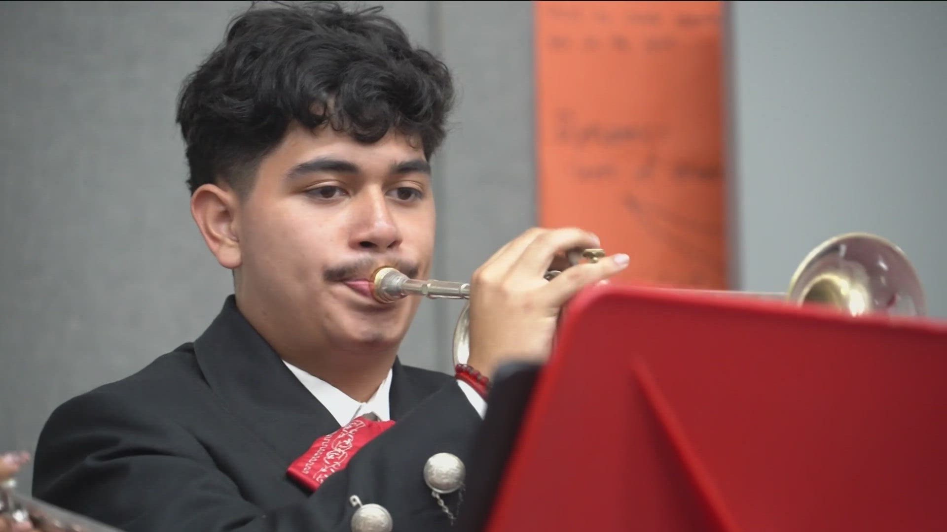 Students at Travis High School celebrate their Hispanic heritage by performing in a mariachi ensemble.