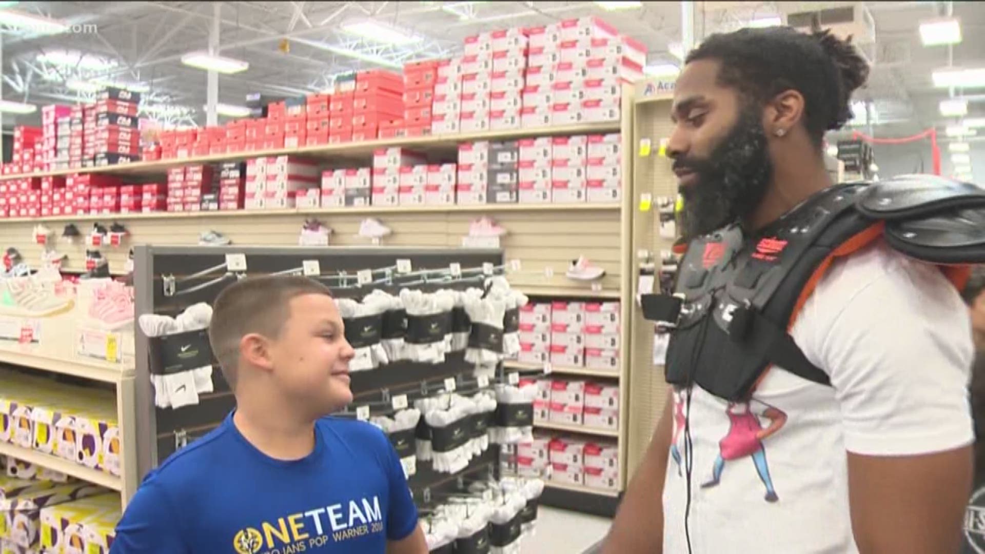 Former Texas Longhorn and retired Tennessee Titan Michael Griffin took 16 young Austin-area athletes on a $200 shopping spree at Academy Sports + Outdoors.