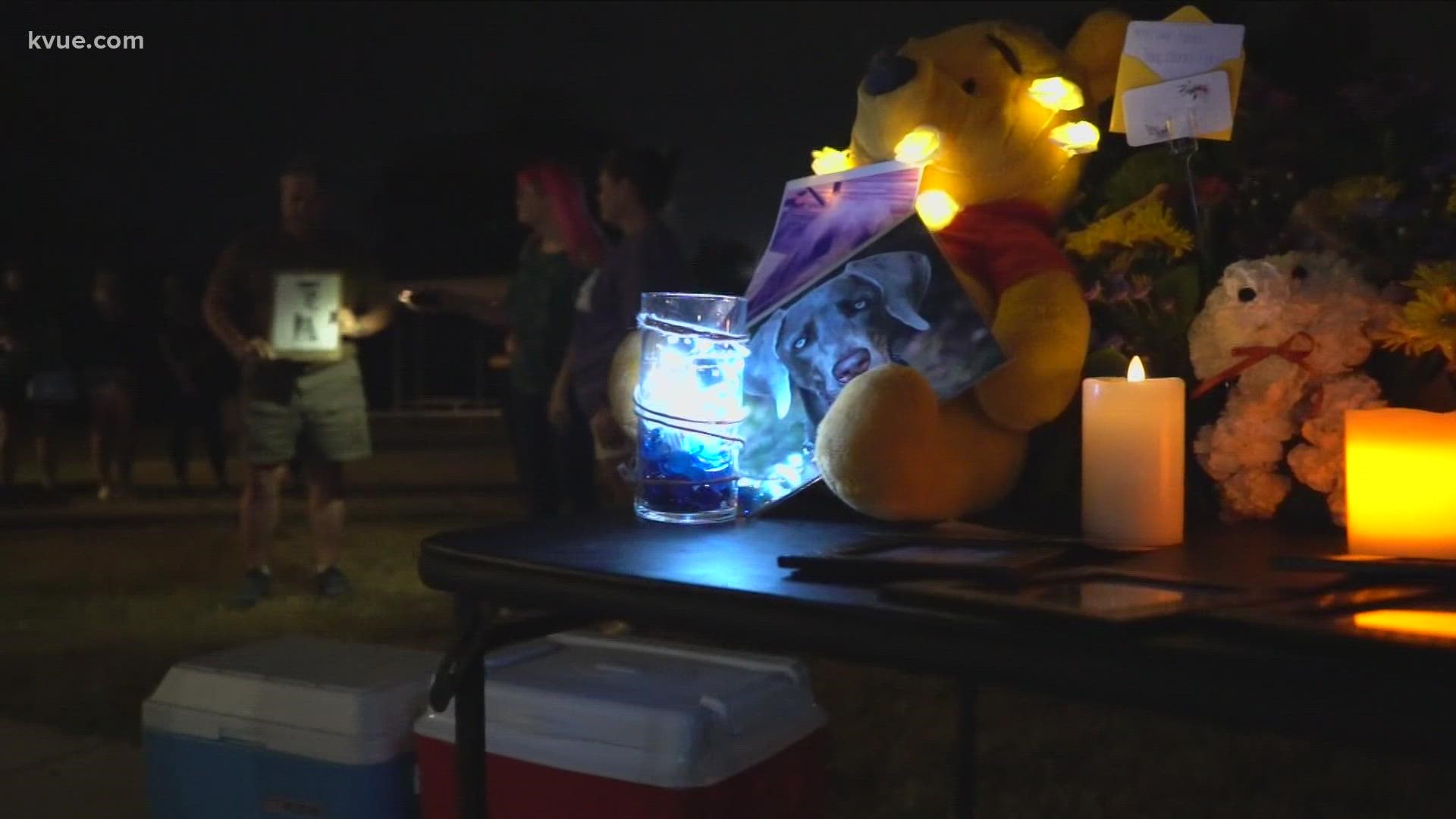 Georgetown families held a vigil to mourn the loss of dogs killed in the Ponderosa Pet Resort boarding facility fire. The families are hoping they can heal together.