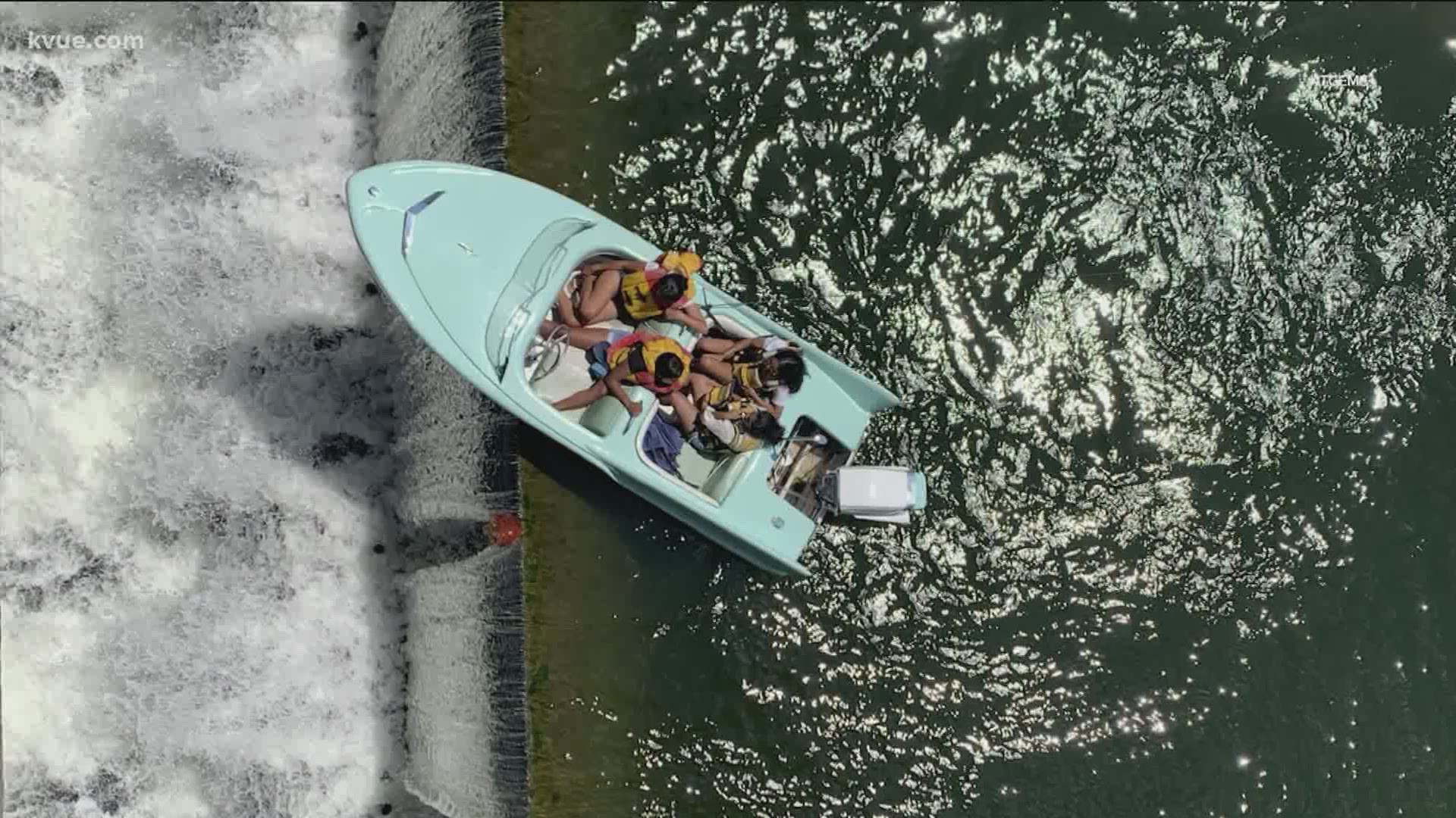 It was a close call for a boat on the Colorado River. Video shows the boat was very close to going over Longhorn Dam before the boaters were rescued.