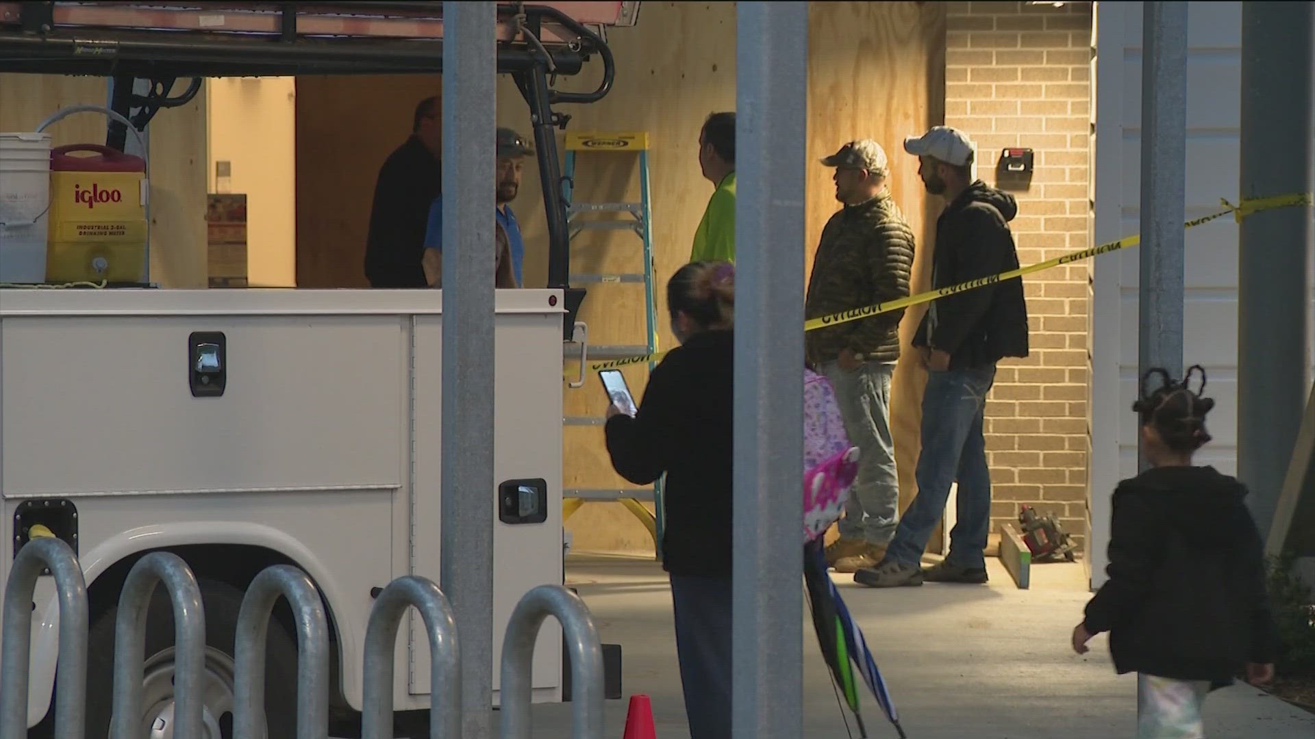 A North Austin elementary school is boarded up after a drive drove through the front entrance.
