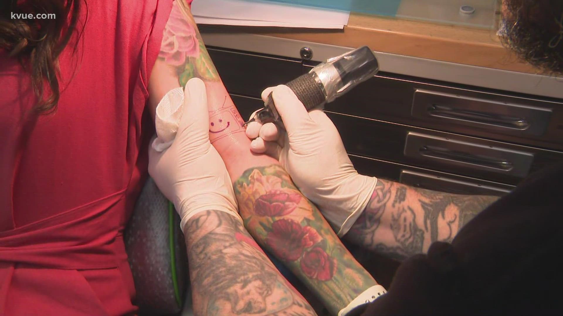 KVUE's Brittany Flowers supported local by getting a tattoo on live TV at Atomic Tattoo.