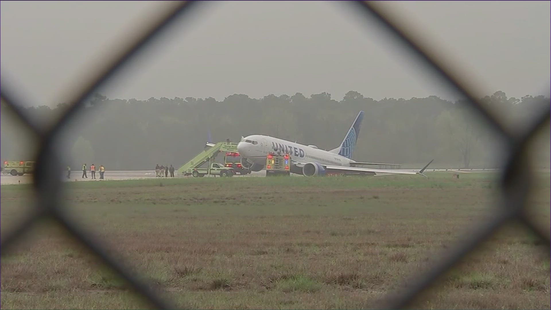 Passengers were forced to evacuate a plane after it went into the grass at Houston's George Bush Intercontinental Airport.