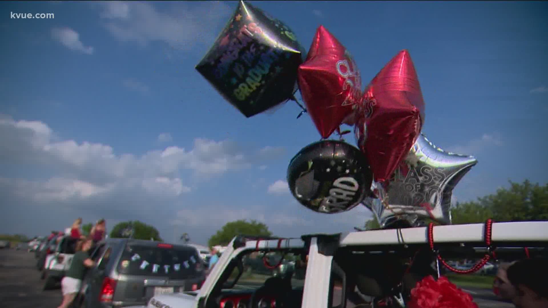 With their in-person graduation pushed back due to COVID-19, the parents of Lake Travis High School students organized a car parade to celebrate.