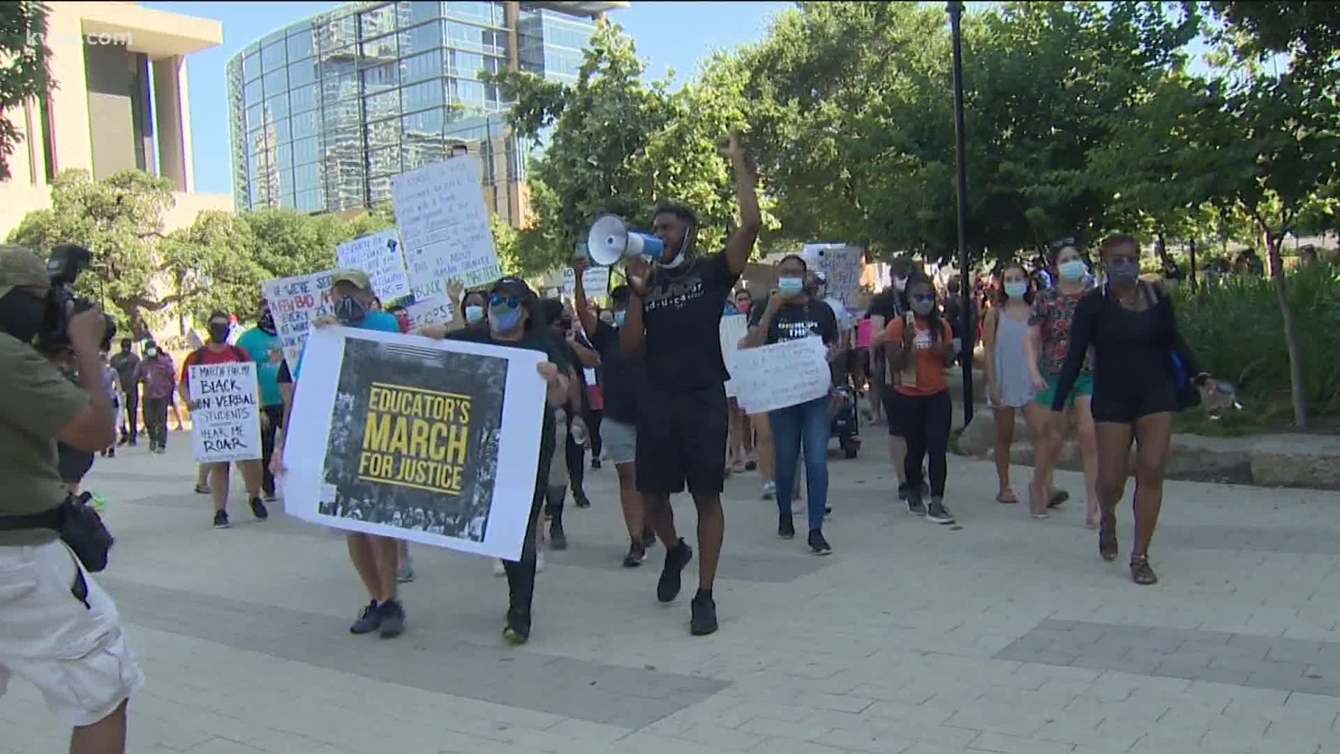 Hundreds or educators, parents and students marched in Downtown Austin to protest racism and police brutality.