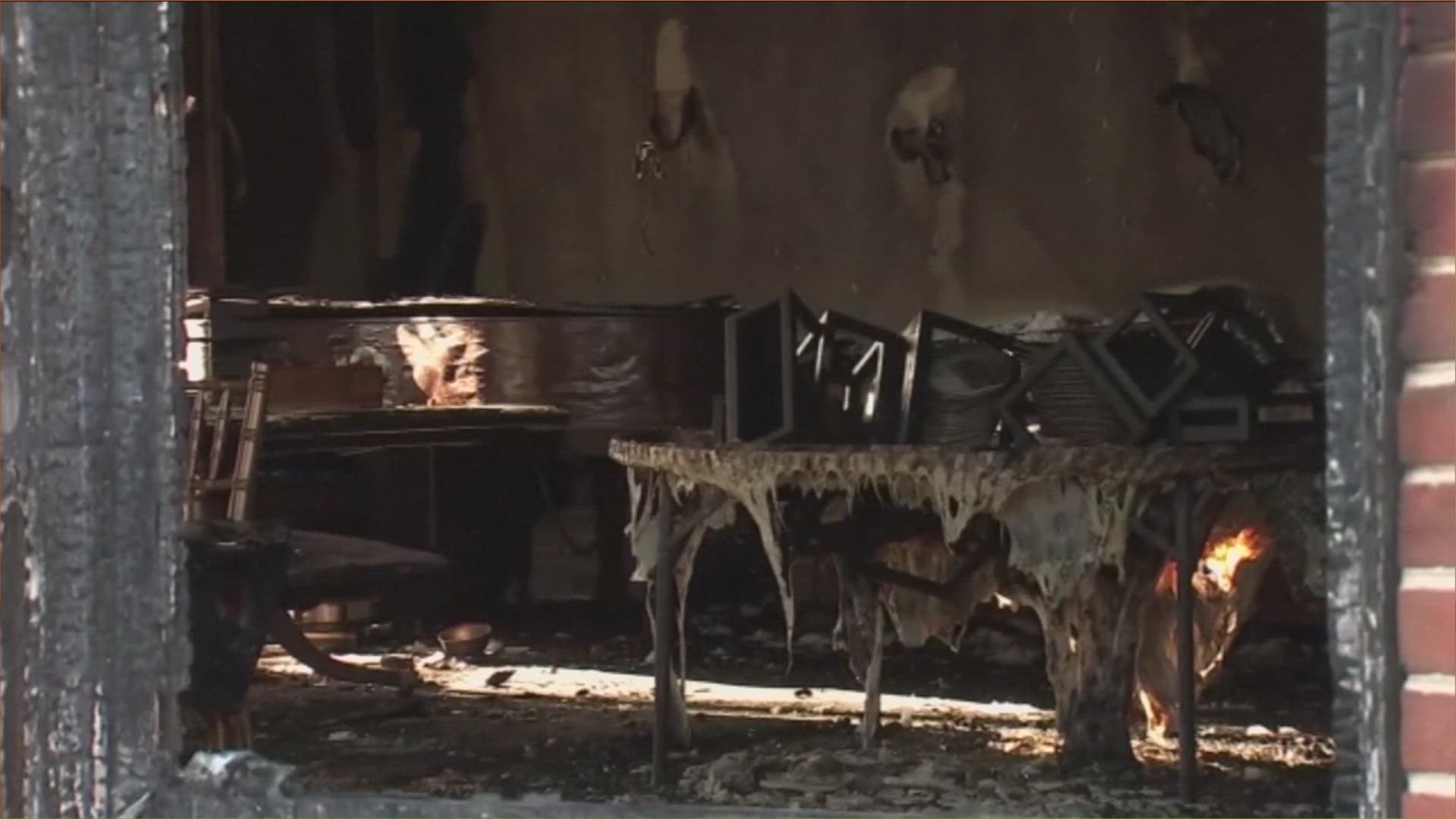 The suspect is charged with arson, homicide and terrorism after reportedly lighting a fire on Sunday morning. 