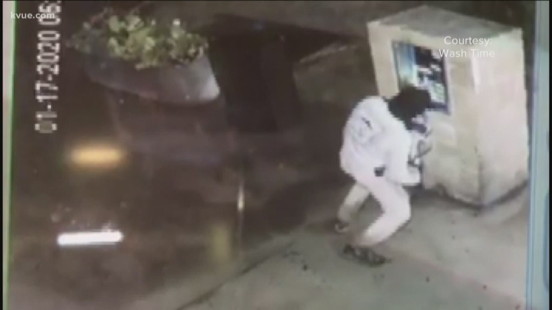 Video from a car wash in Liberty Hill shows a man who police said is a probationary volunteer firefighter using the "jaws of life" to break into the pay station.