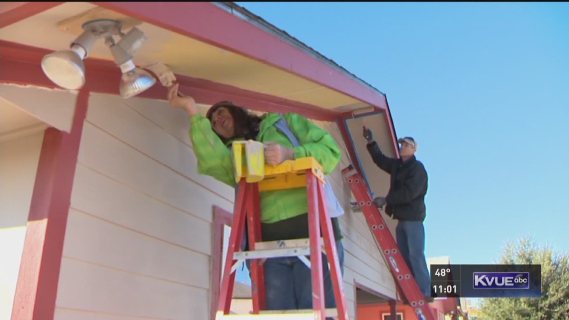 Two deserving families received a new home Friday after weeks of hard work on both the families' and volunteers' part.
