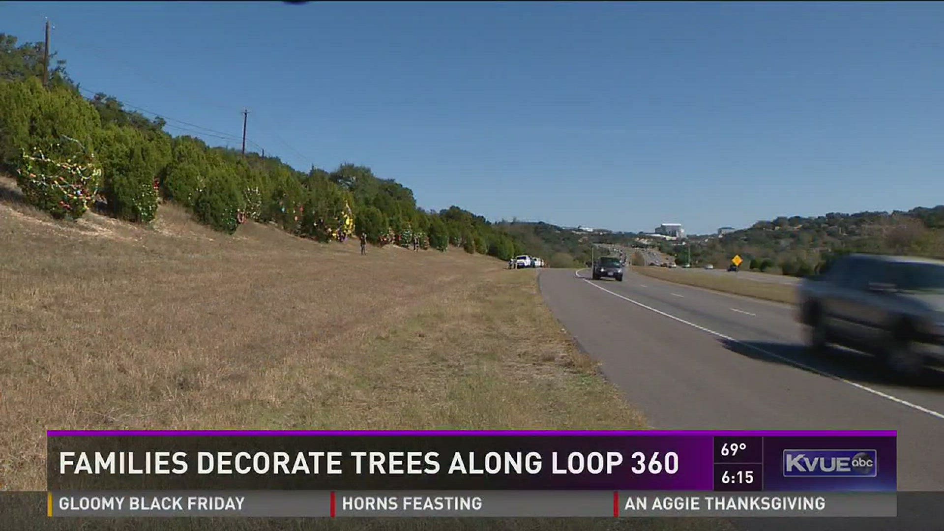 Families decorate trees along Loop 360