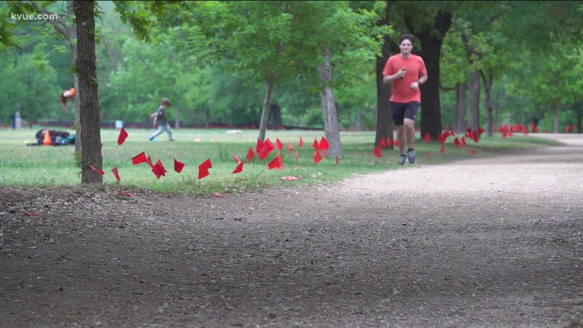 Red flags have been placed along a half-mile route at the park. They will be on display through Sunday.