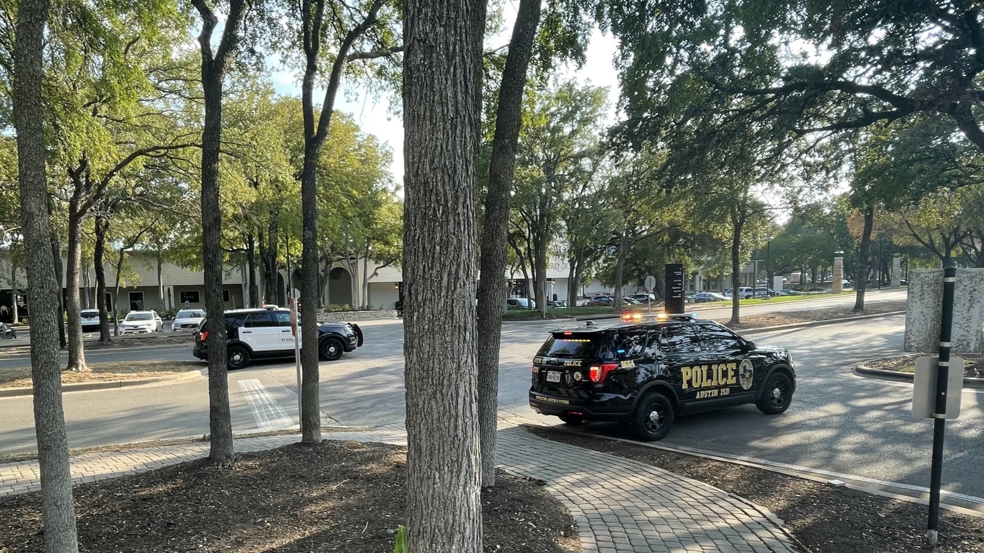 The Austin Police Department give a briefing after two people were killed in a shooting at the Arboretum Shopping Center.