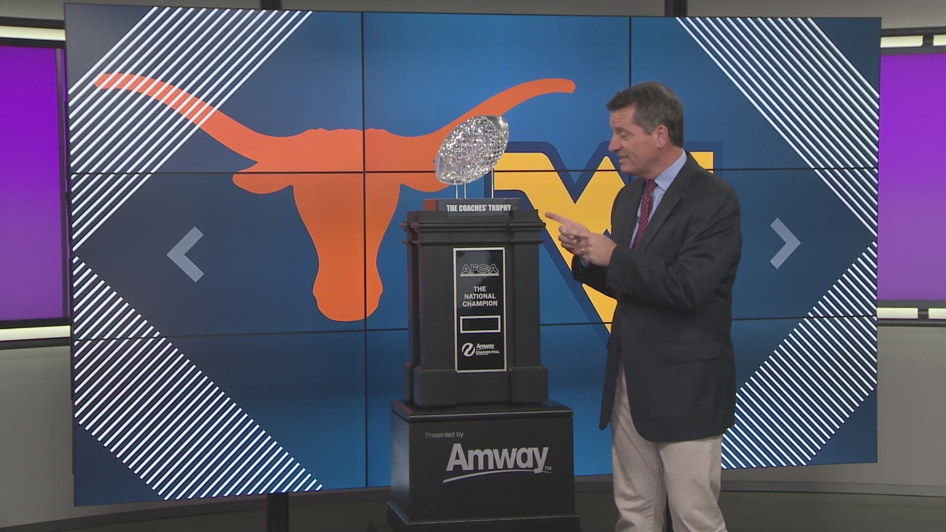 The National Championship Trophy visits KVUE as Texas prepares for West Virginia