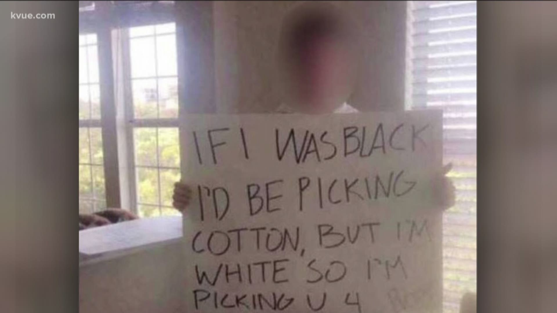 Many are calling the poster a Vandergrift High School student is holding racist.