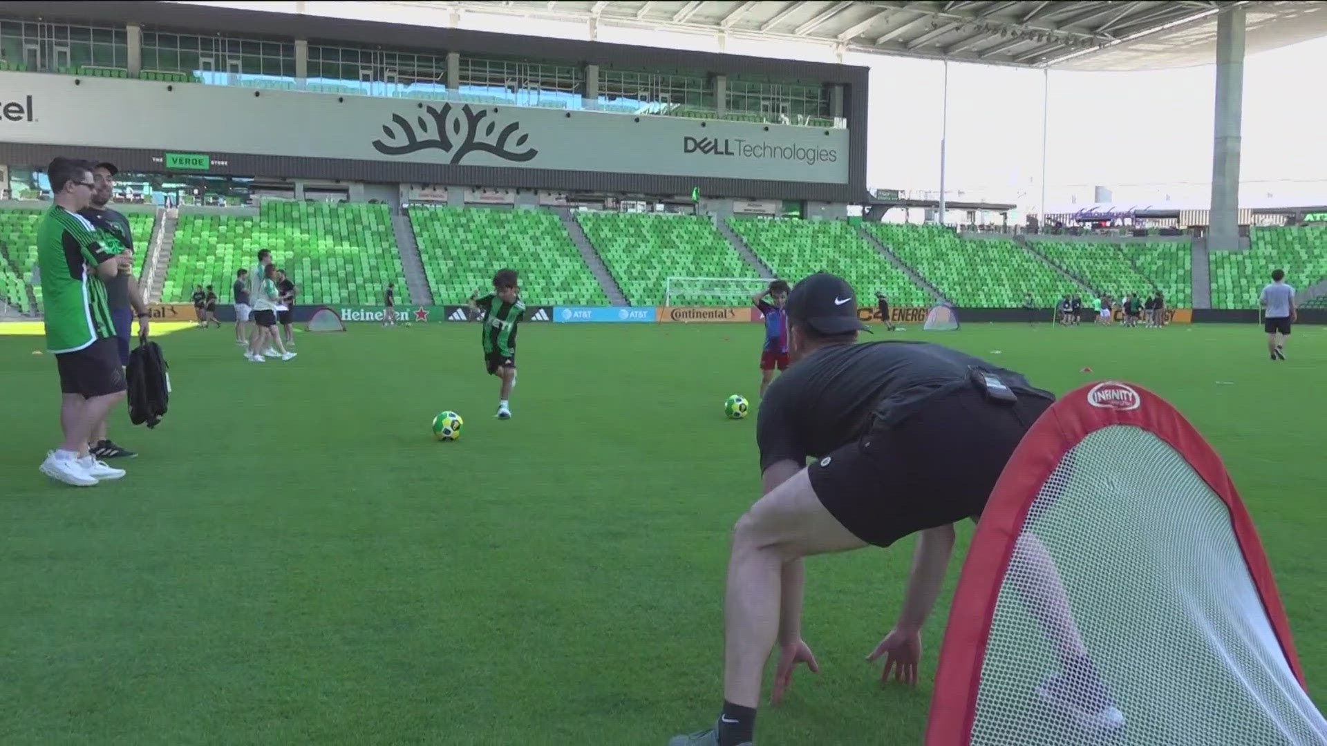 Members of the Verde & Black led fans through an Austin FC experience.