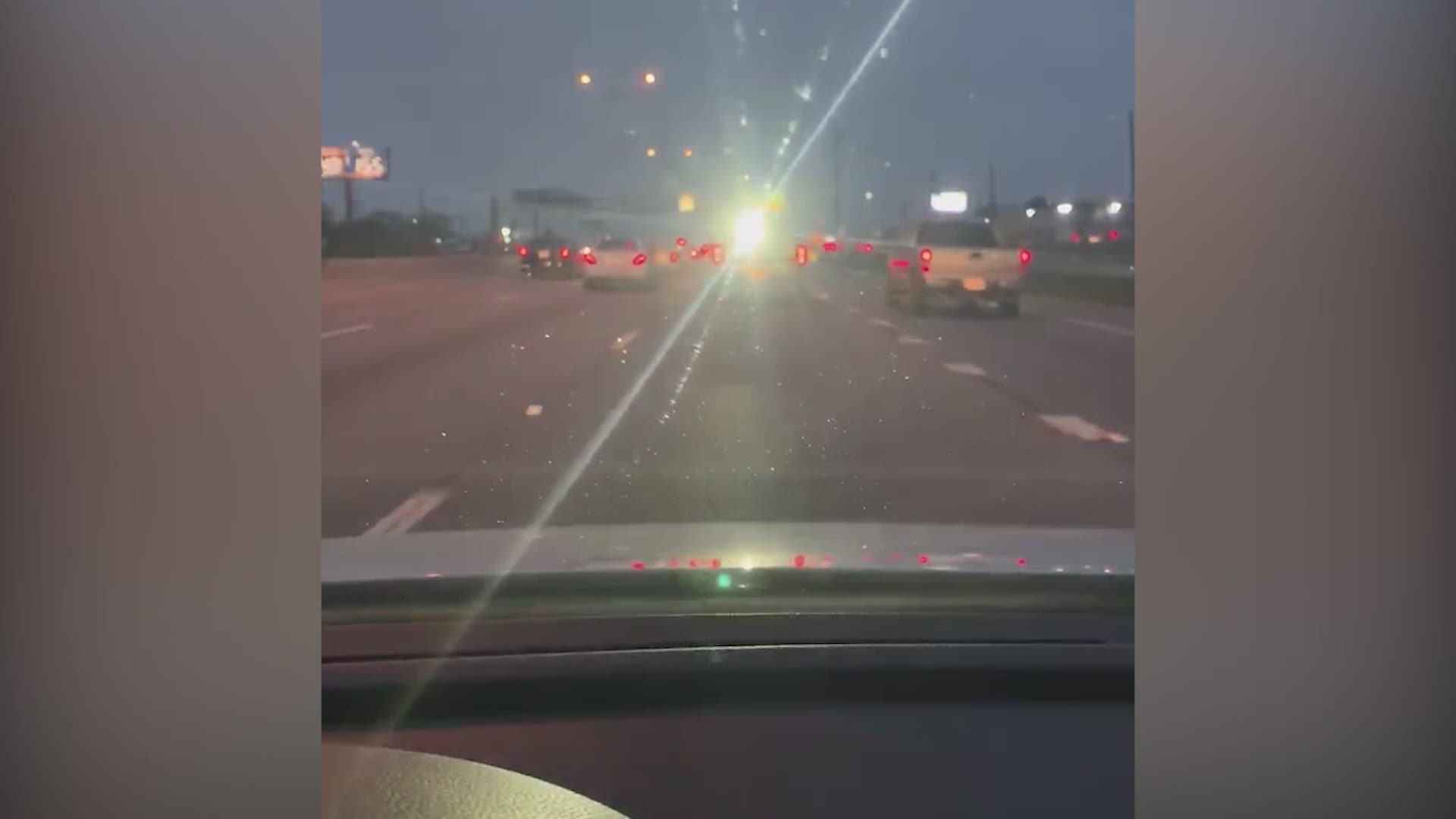 Man says road rage caused bright light to come from driver's truck.