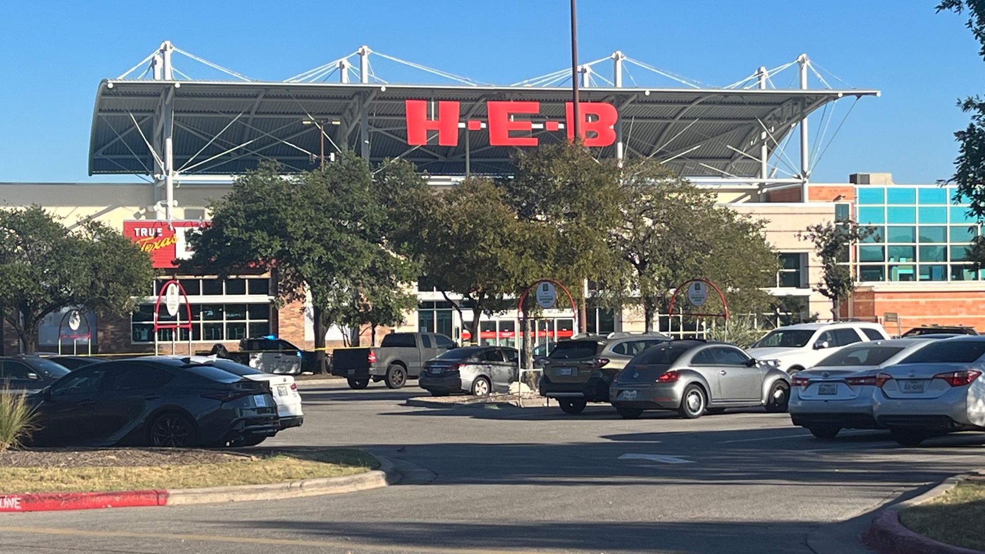 Police said the man was shot and killed after he allegedly charged at a security guard at an H-E-B in northeast Austin.