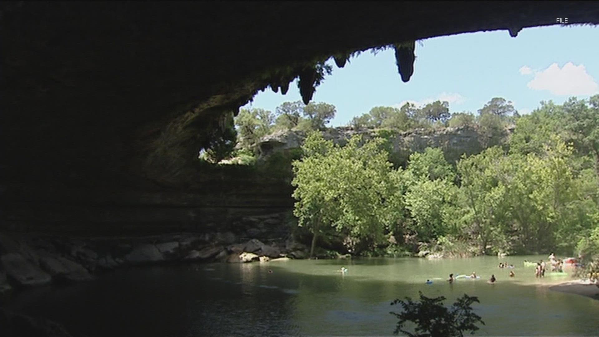 Hamilton Pool is back open again after test results showed the swimming hole now has safe bacteria levels.