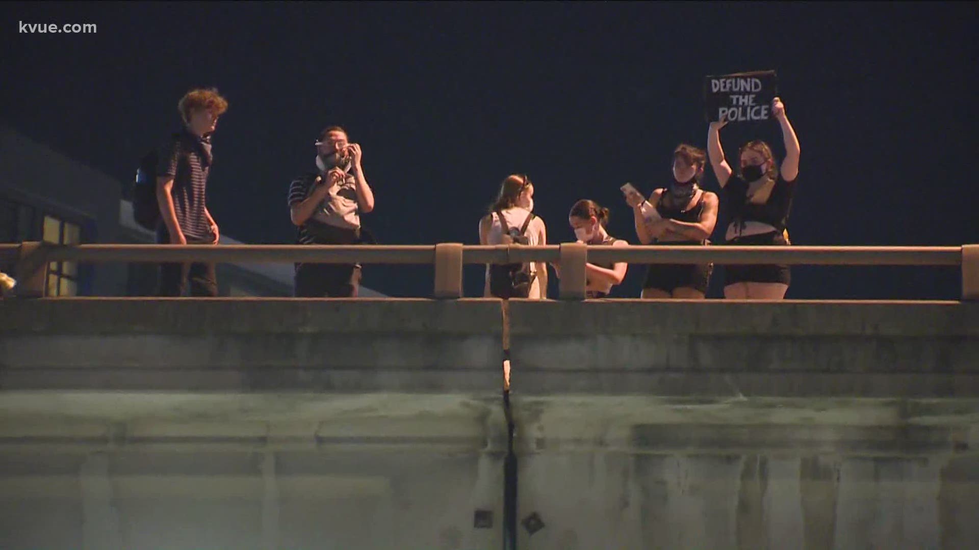 Protesters marched on Interstate Highway 35 at one point on Saturday night.