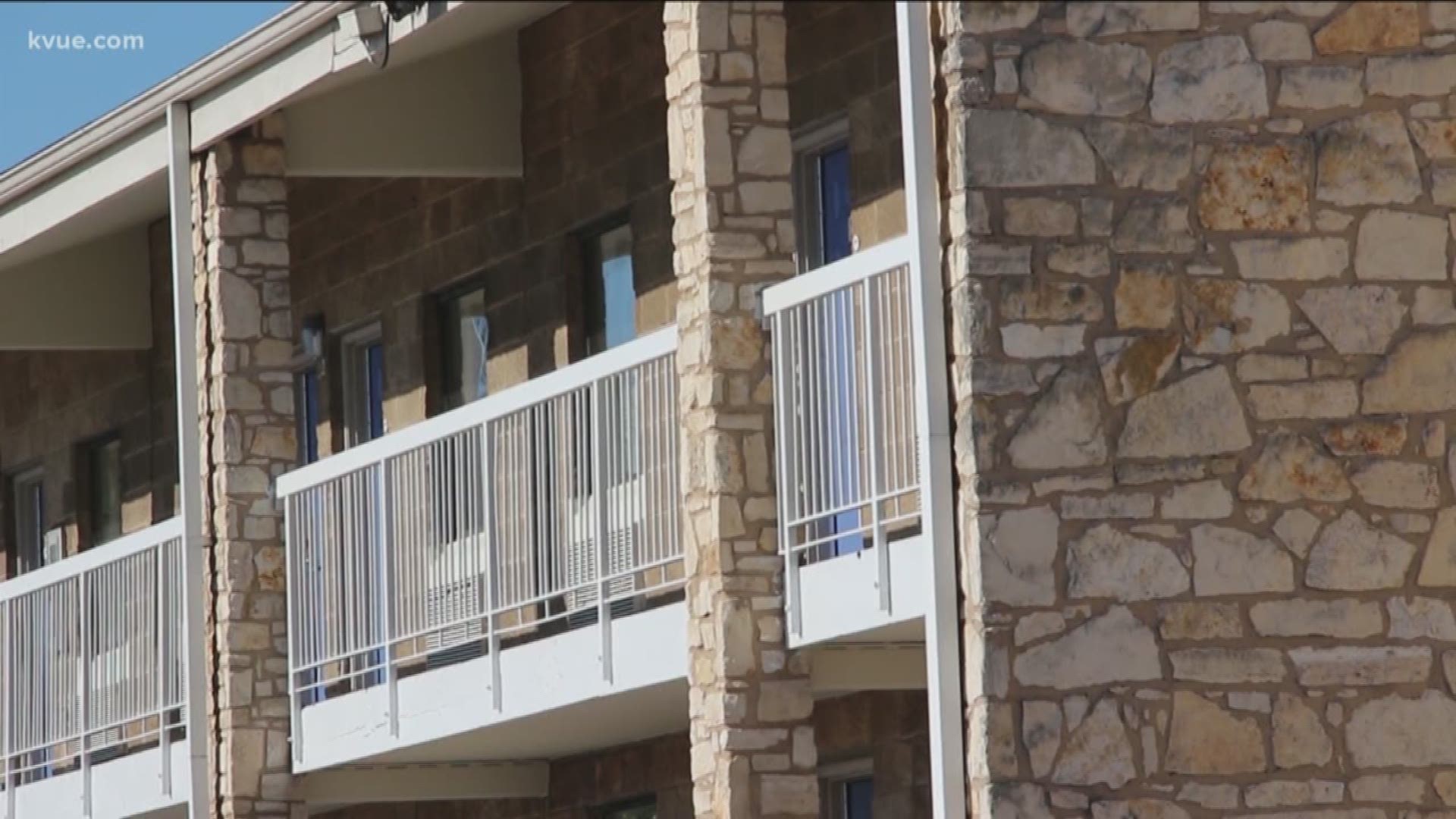 A woman is suing a motel in Austin, claiming three men sexually assaulted her and motel staff didn't do anything to help her.