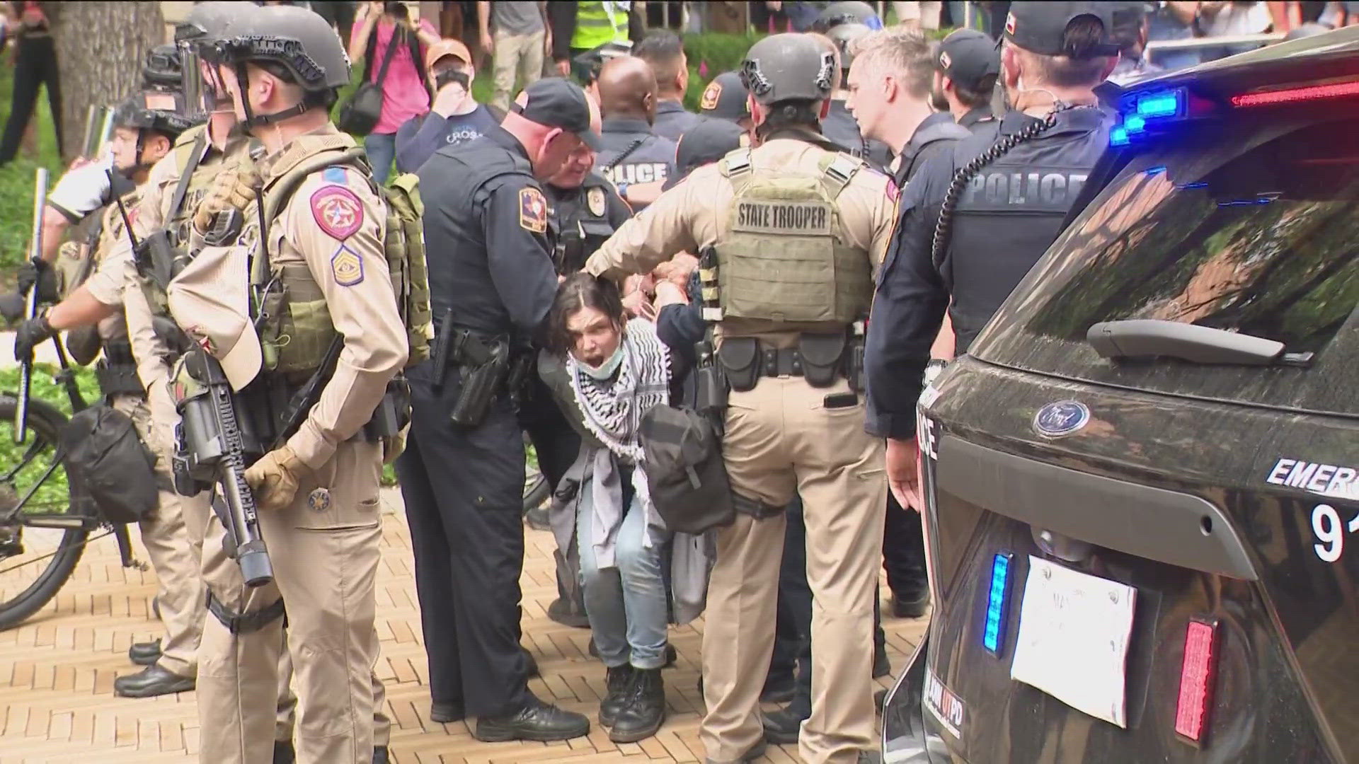 A large pro-Palestine protest on the UT campus that resulted in multiple arrests has moved to the Travis County Jail. At least 50 people were arrested.