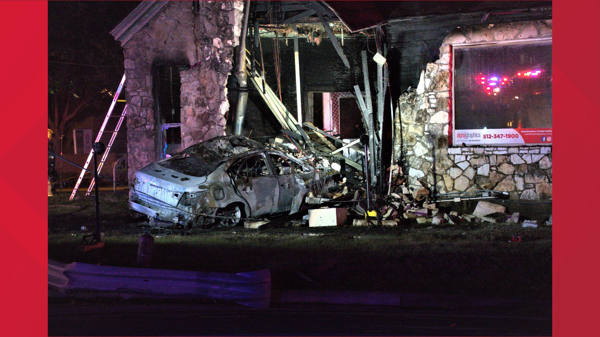 Driver crashes car into building near North Lamar, causing fire