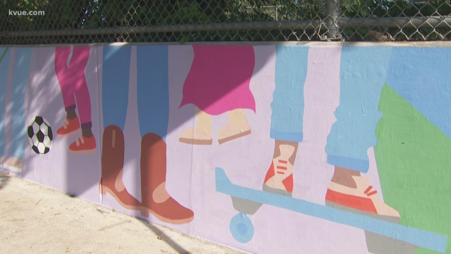 A retaining wall in East Austin is now a work of art thanks to some creative teens.