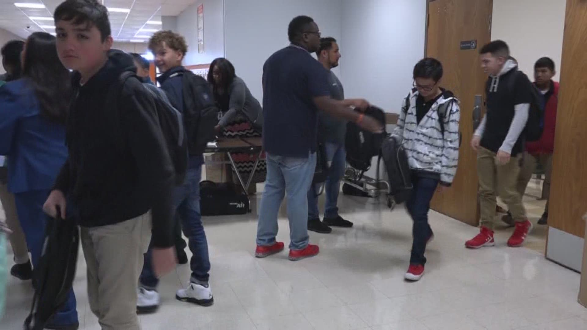 Verizon is supporting Dobie Middle School by supplying each student with a free backpack with school supplies inside.