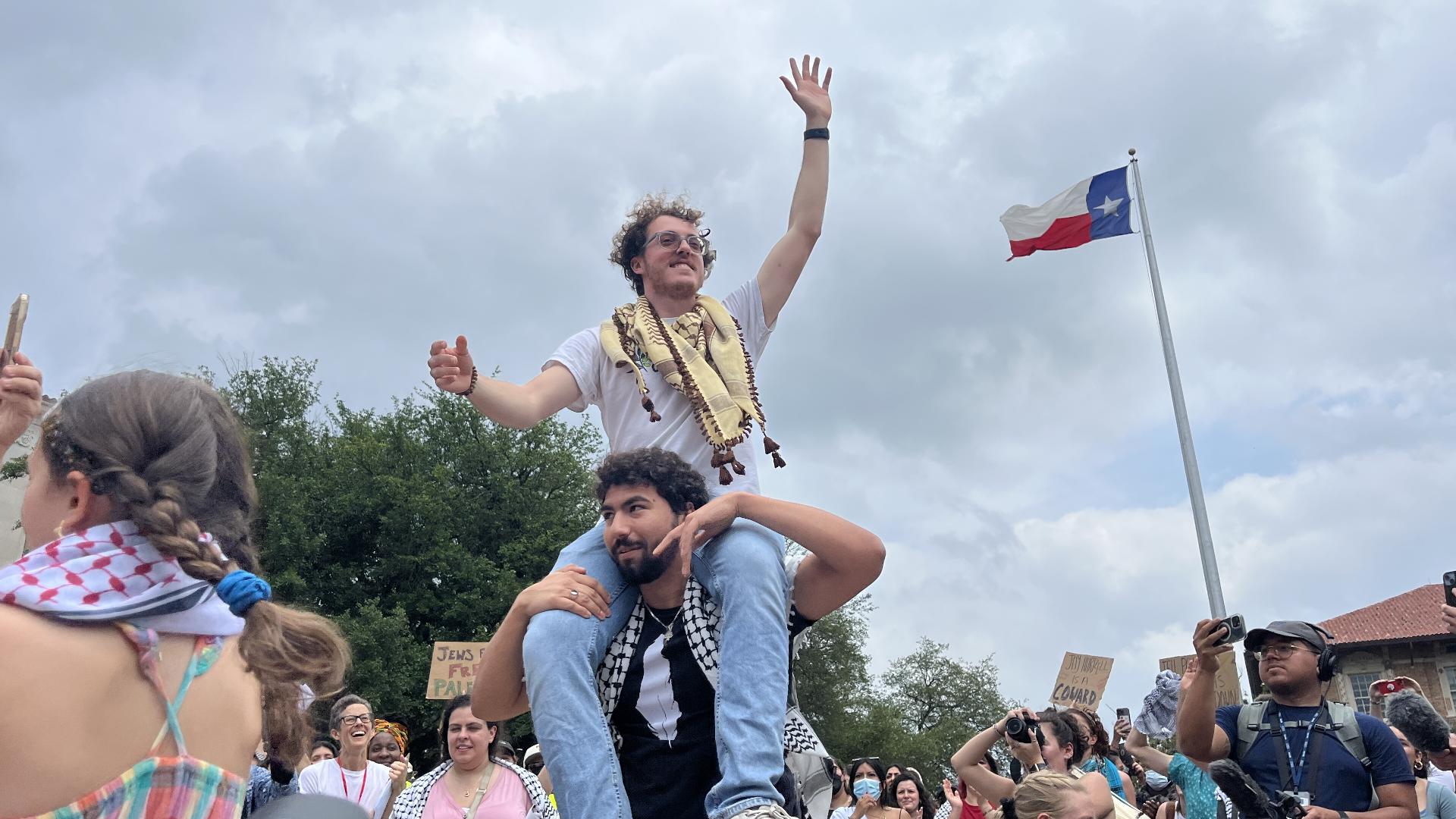 University of Texas administrators say the Palestine Solidarity Committee, which organized Wednesday's protest, is suspended for violating university rules.