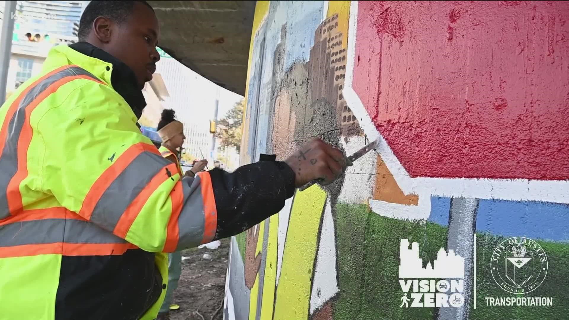 Three murals have been installed in support of the city's Vision Zero plan.