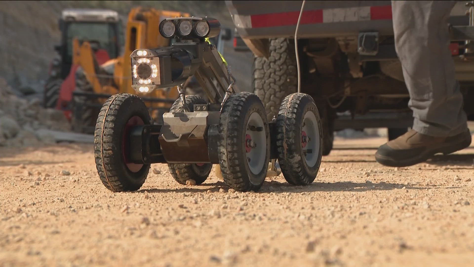 Instead of sending people into storm drains, the Texas Department of Transportation sends "Wall-E" to scout the scene for any hazards.