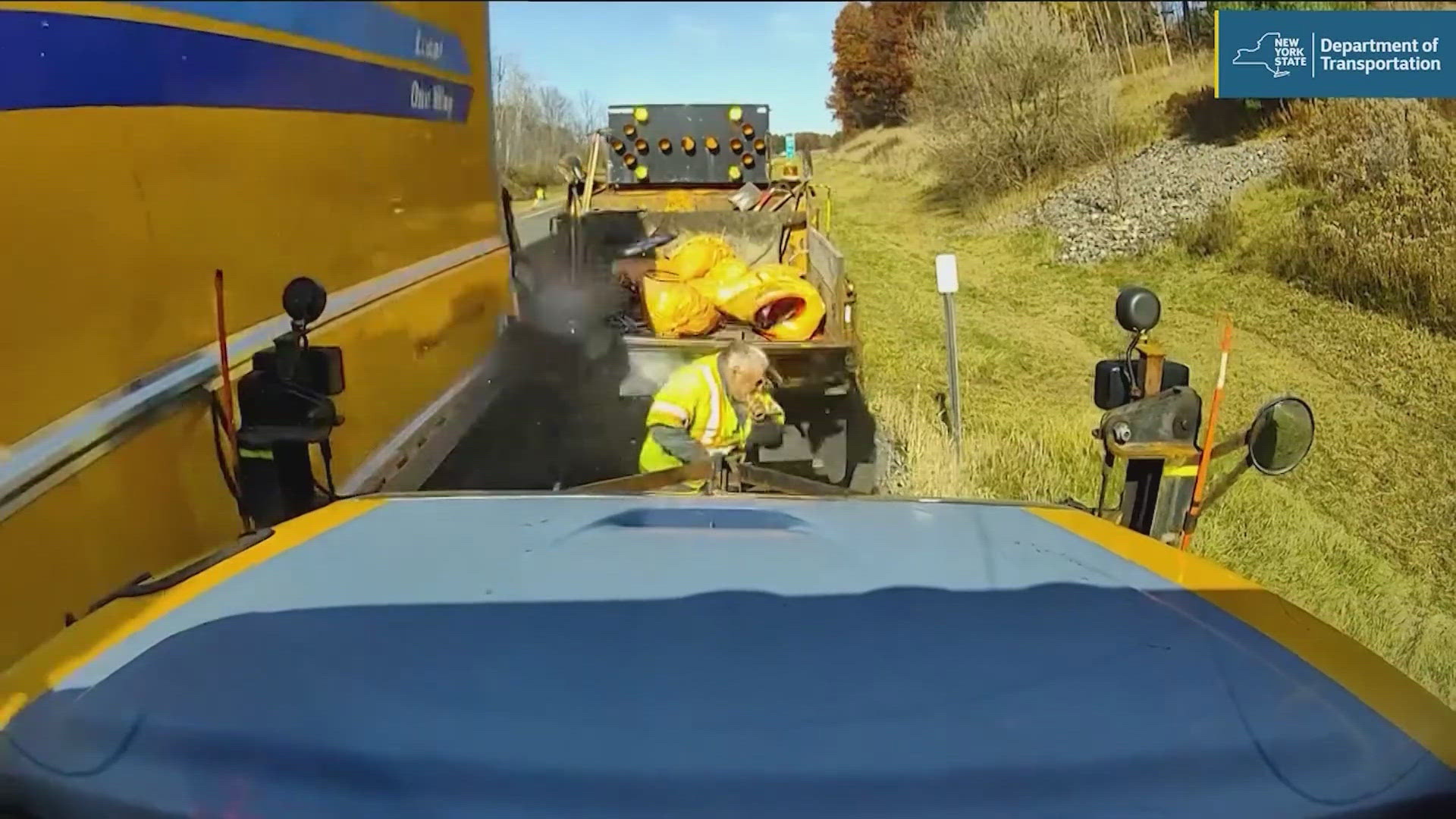 The worker was so close to being hit, the wind from the near-miss knocked off his hard hat.