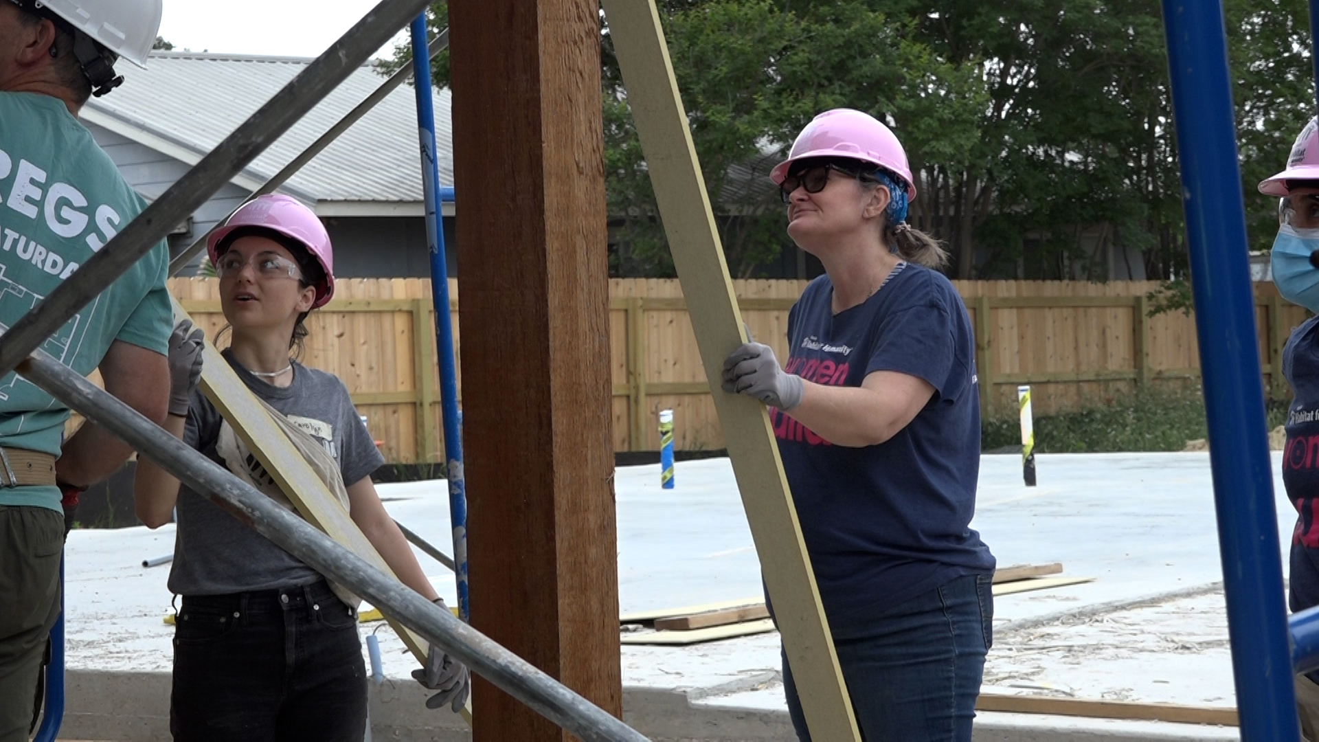 A day before Mother’s Day, a construction crew made up mostly of women worked on town homes for single mothers in East Austin.