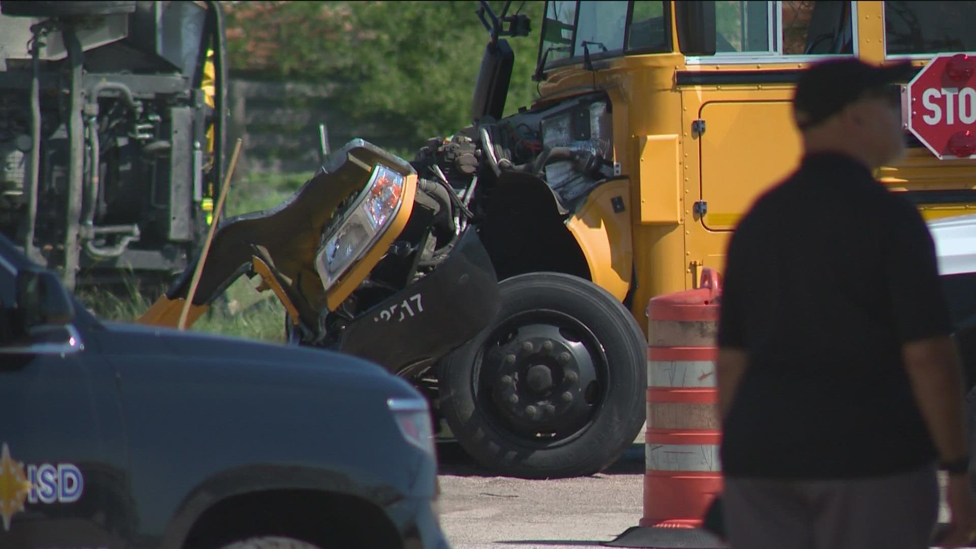 Leander police are investigating a crash between a FedEx truck and a school bus.