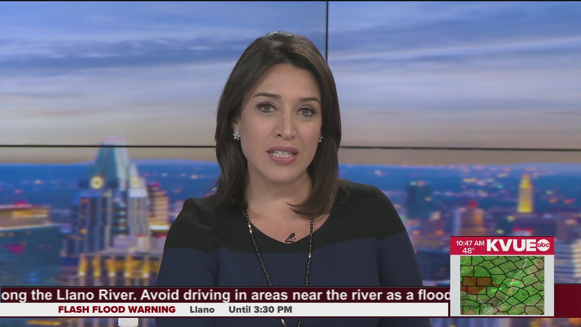 Rushing floodwaters from Llano River slice through Kingsland bridge