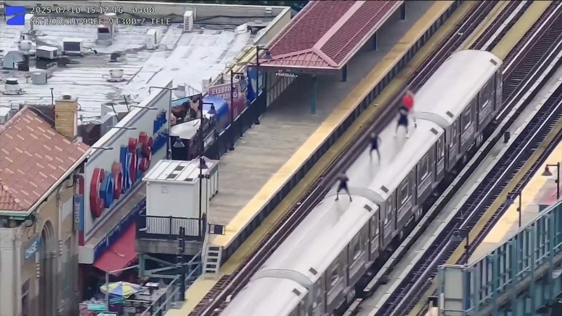 The group -ranging from 12 and 16 years old- was seen riding on top of a moving train through the Bronx. 