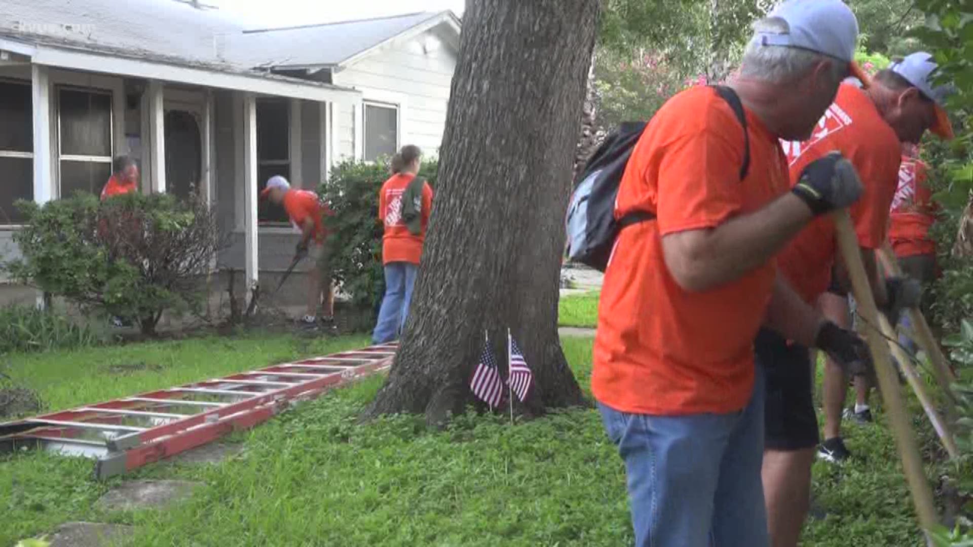A section of the Holly neighborhood in East Austin was shut down today as 600 volunteers took over to make repairs to the houses of local veterans.