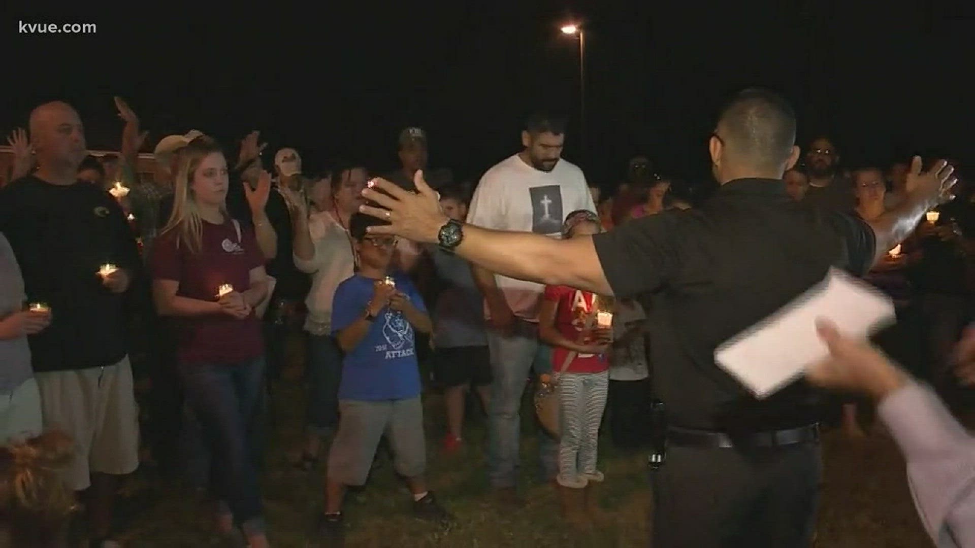 Strangers, neighbors, and family members are gathered at a vigil tonight to grieve together.