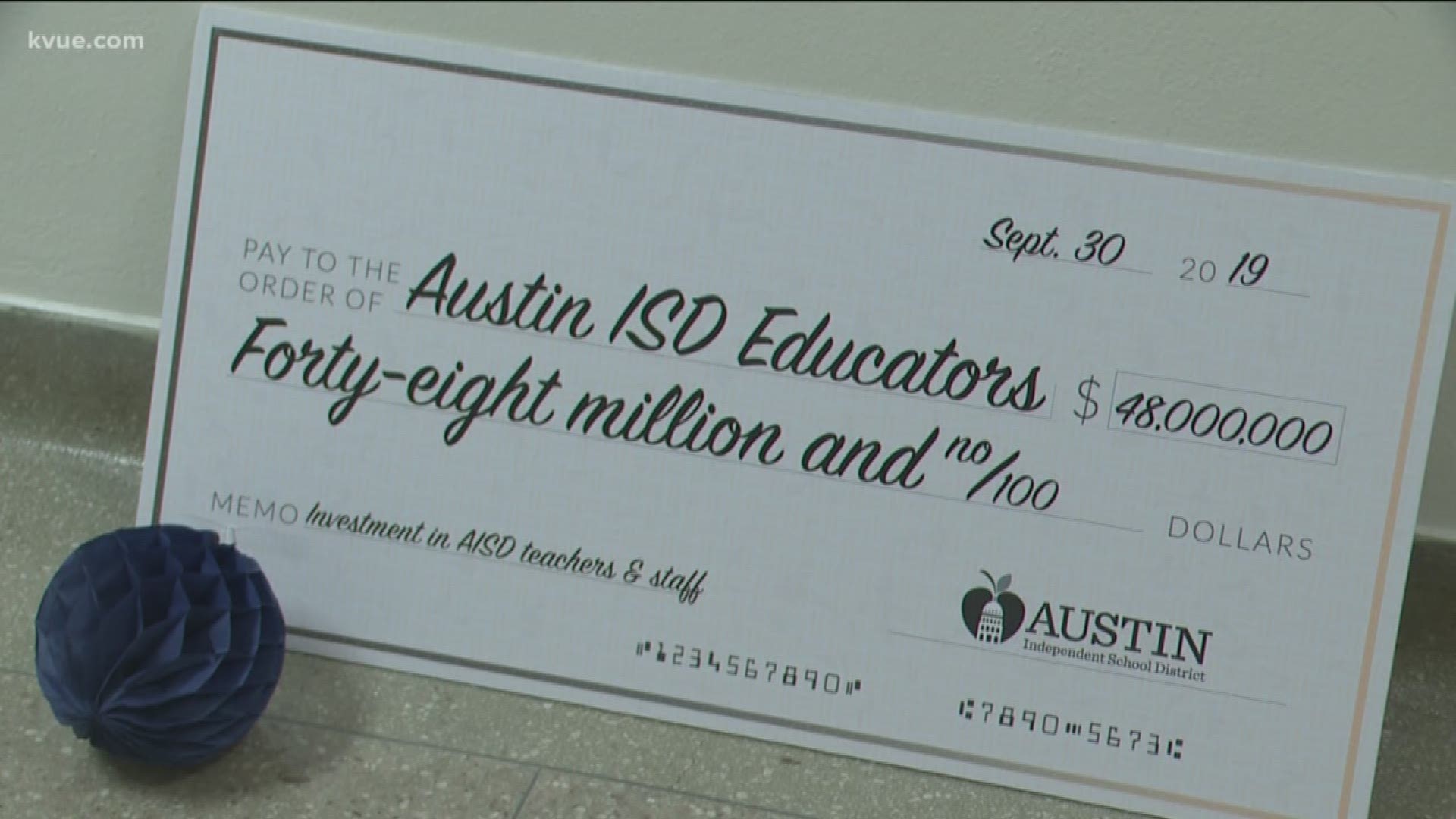 Austin ISD teachers and staff celebrated a boost that's coming to their bank accounts.