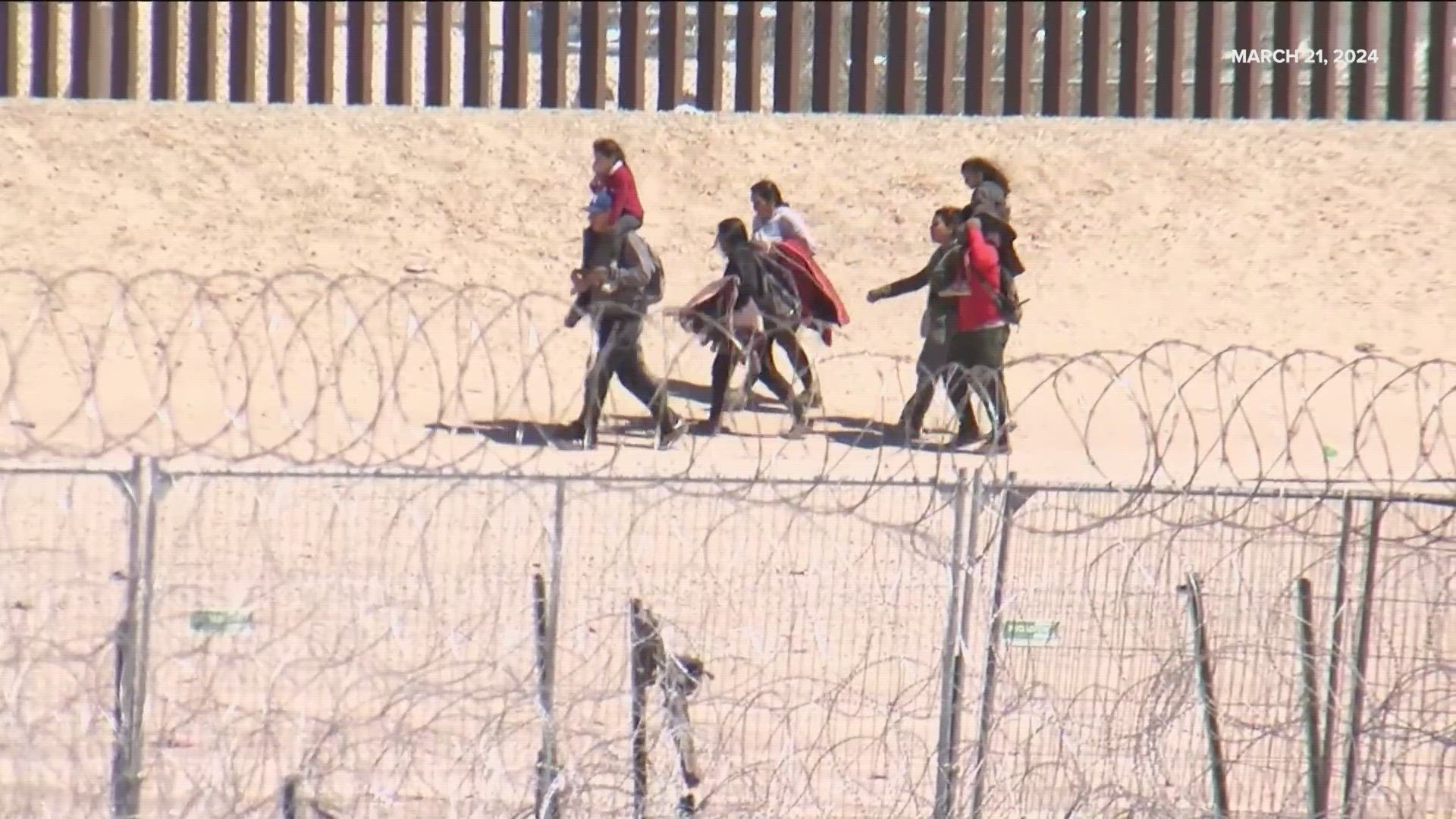 The migrants were arrested approximately two weeks ago in El Paso and despite a judge's attempt to release them, they remain in custody.