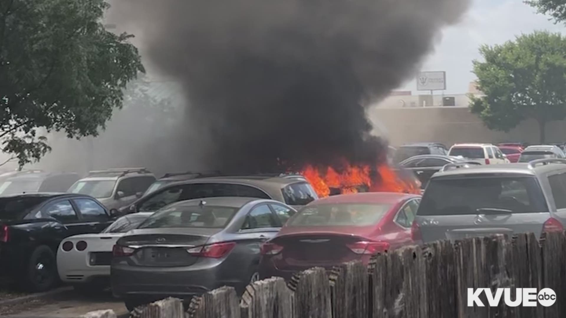 A vehicle fire outside of Austin Direct Auto Sales in northwest Austin extended to the business's office Saturday afternoon.